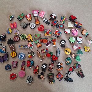 Crocs charms lot over 75